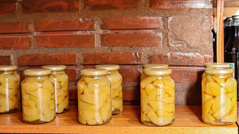 freshly canned peaches on shelf