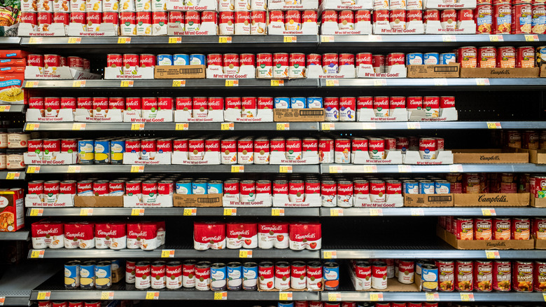 Cans of soup on shelves