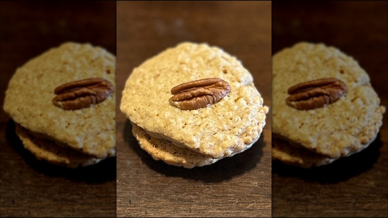 The yellowhammer cookie, a nutty sandwich cookie topped with a pecan