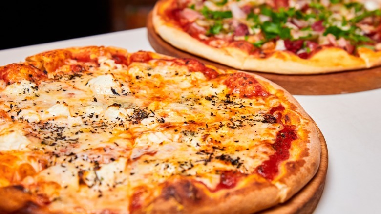 Two pizza pies