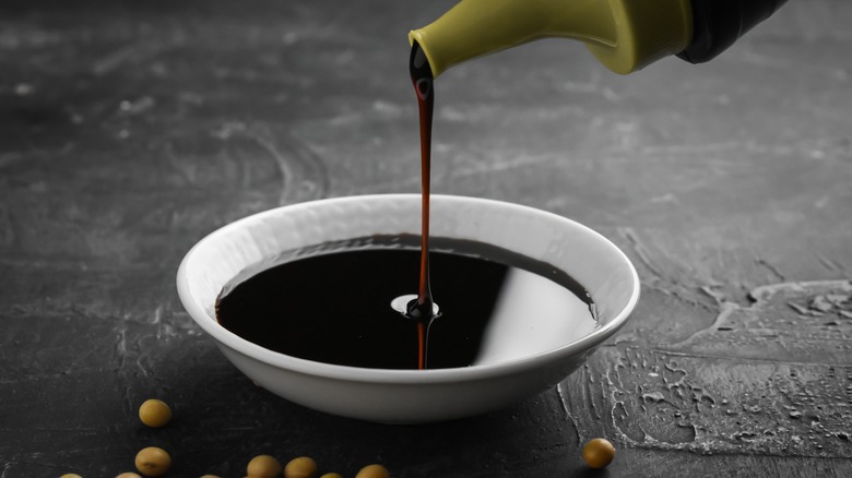 Pouring soy sauce 
