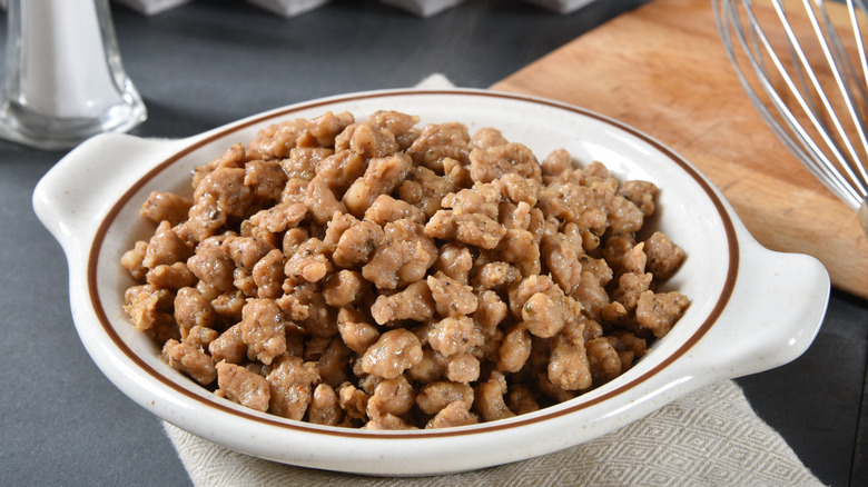 Crumbled cooked sausage pieces
