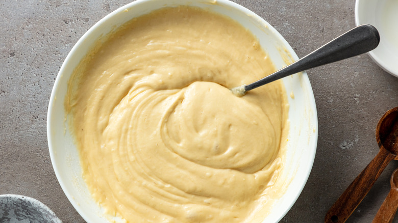 Thick pancake batter in bowl