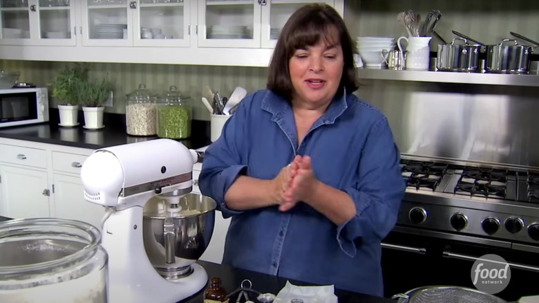 Ina Garten makes a coconut cake in her kitchen