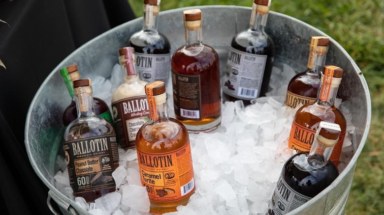 Bottles of whiskey in an ice bucket