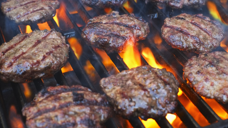Burgers cooking on grill