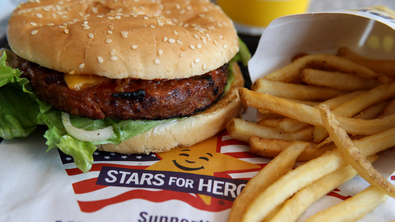 Carl's Jr. Beyond Meat Burger, sitting next to a carton of fries