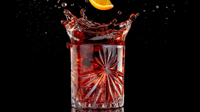 glass of splashing liqueur