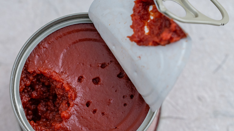 Open can of tomato paste