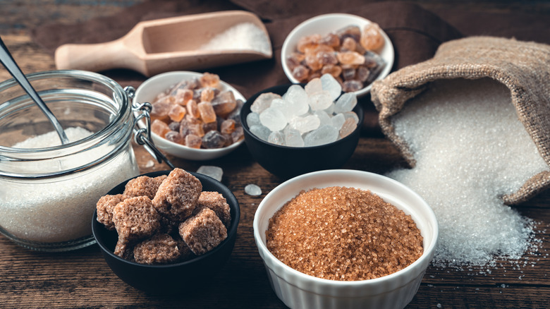 Different sugars in small bowls