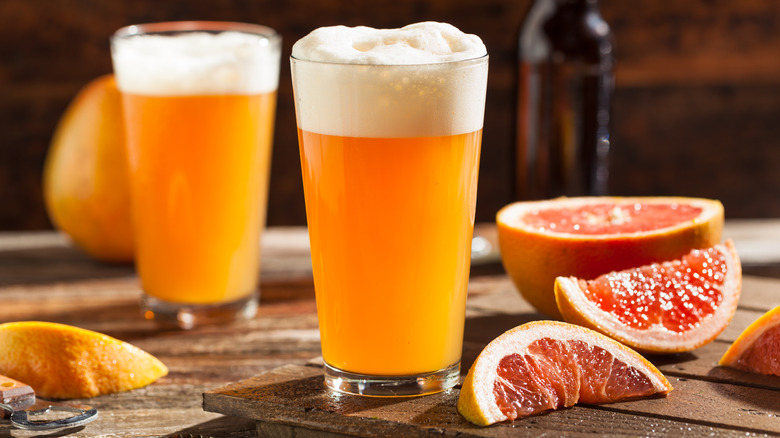two shandies with grapefruit wedges