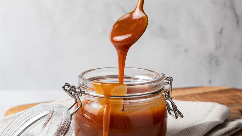 caramel sauce and spoon