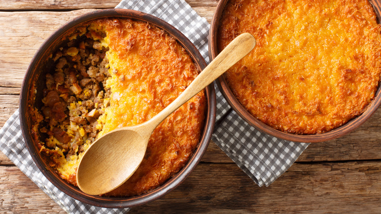 Homemade pot pie with a cheesy cornbread crust