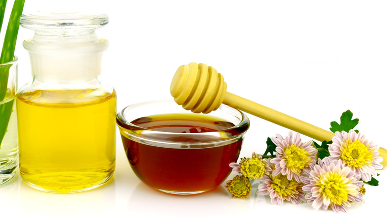 Honey and jar of vinegar