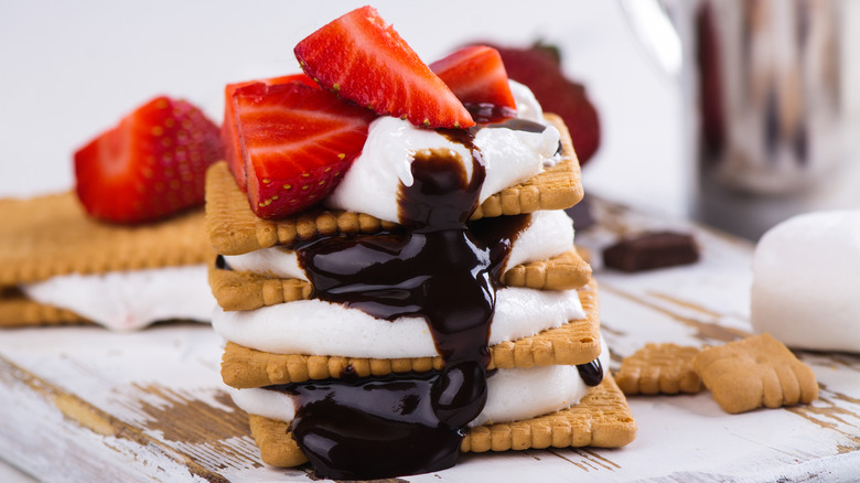 Assembled s'mores with strawberries