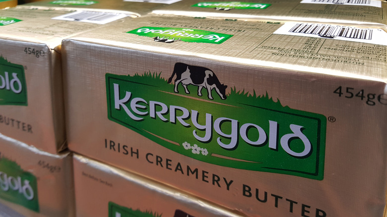 Sticks of Kerrygold Irish Creamery Butter in a store fridge cabinet