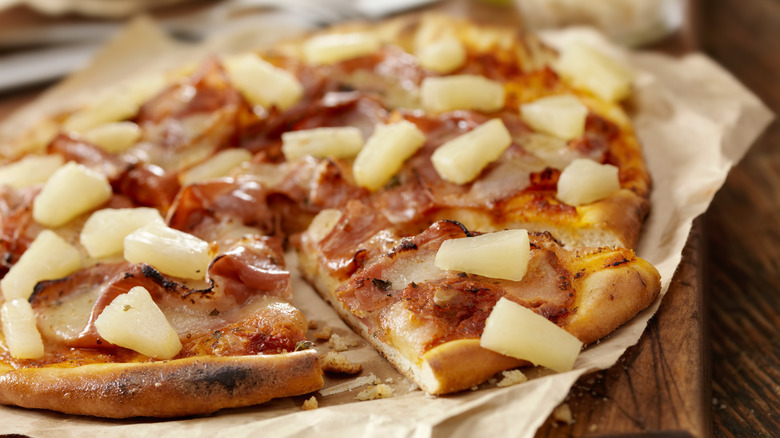 Hawaiian pizza with chunks of pineapple and ham