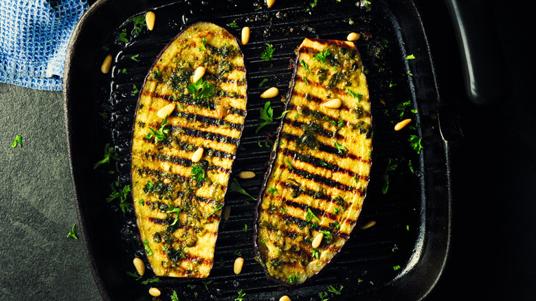 Grilled eggplant with herbs and pine nuts