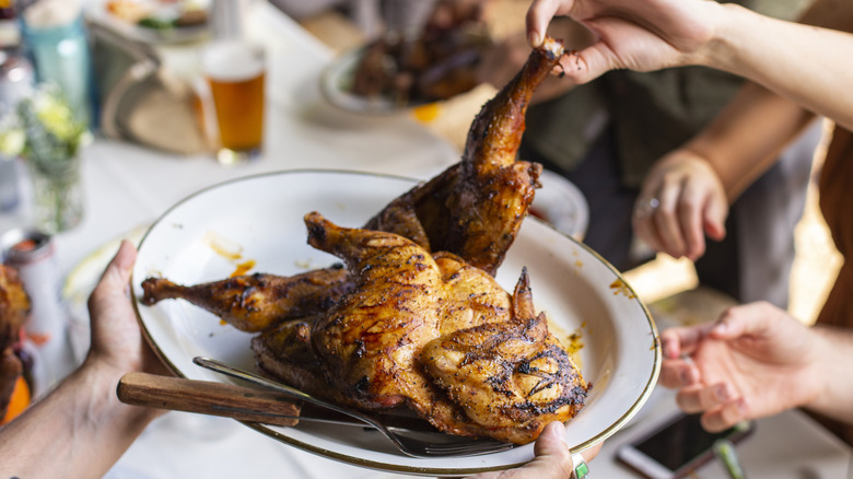 Serving grilled chicken