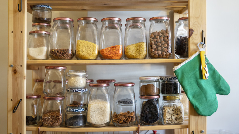 A view of a row of well-stocked pantry shelves