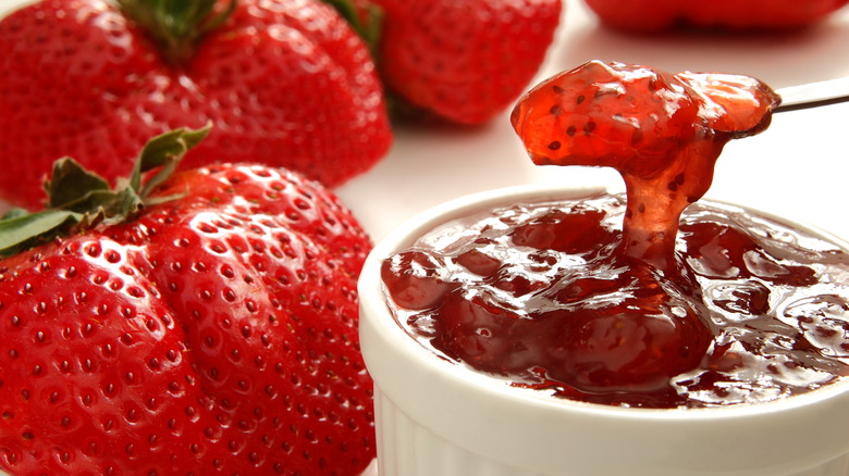 strawberry preserves on knife
