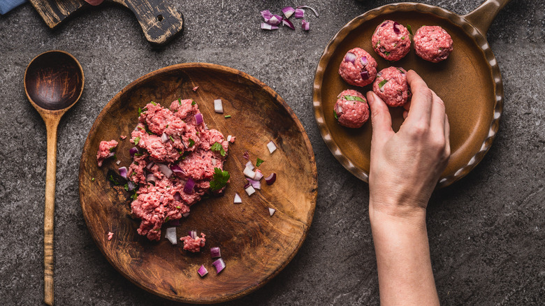Person making meatballs