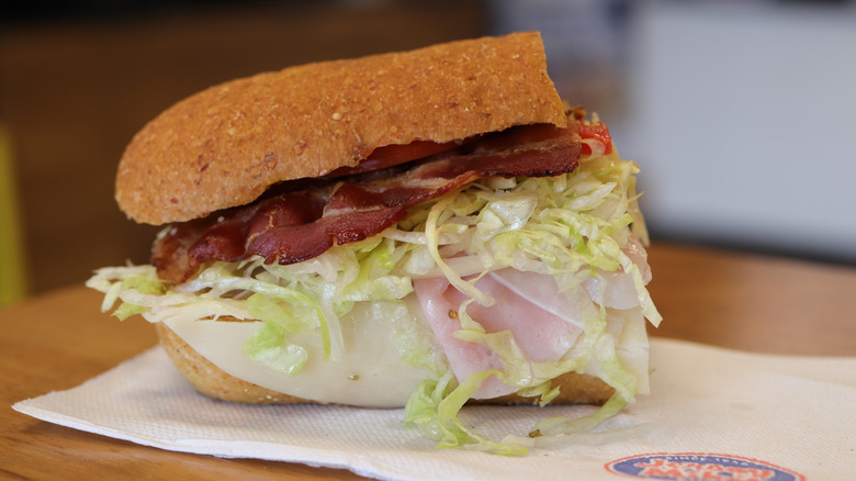 Jersey Mike's sandwich, with lettuce, bacon, and cold cuts