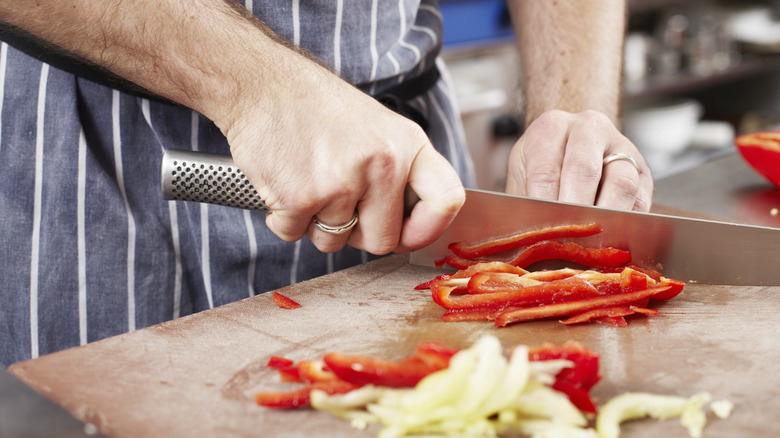 Chef chopping vegetables