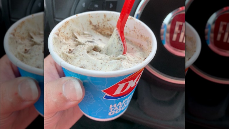 A person holds a Thin Mints Blizzard