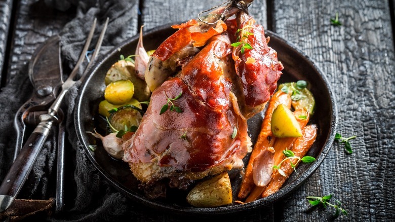 Pheasant in skillet with potatoes