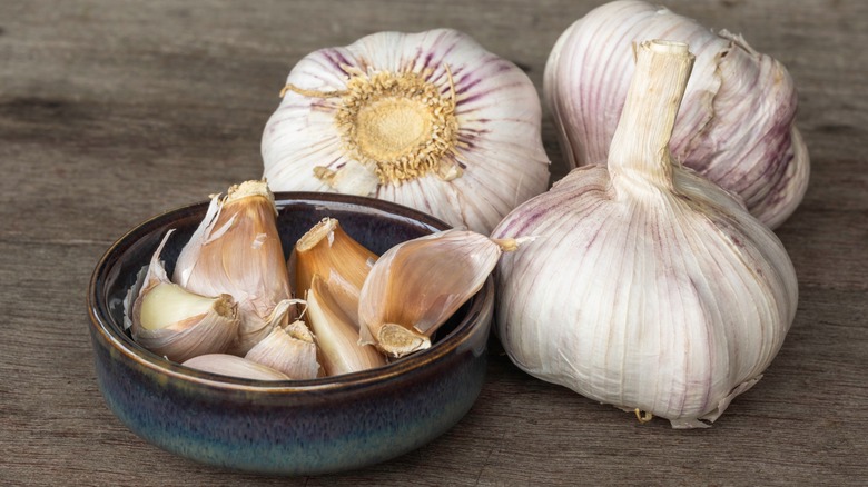 garlic cloves and garlic heads
