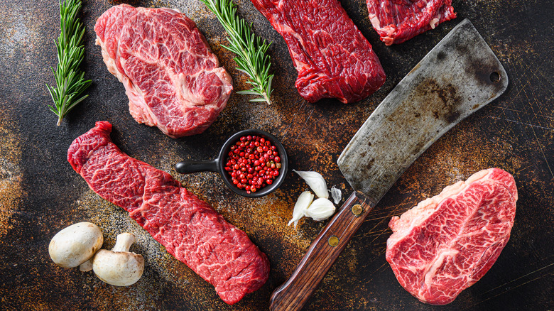various raw beef on cutting board