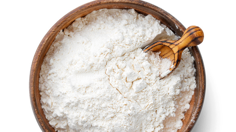 wooden bowl with flour