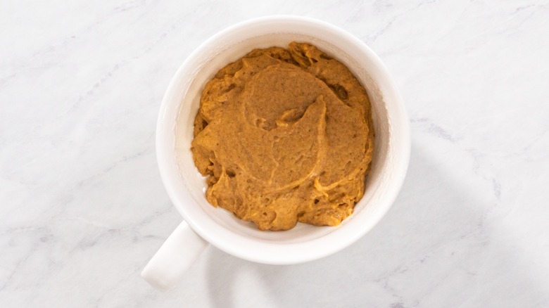 cake batter in mug