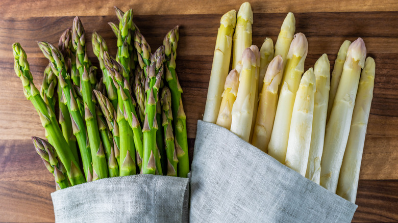 bunches of green and white asparagus