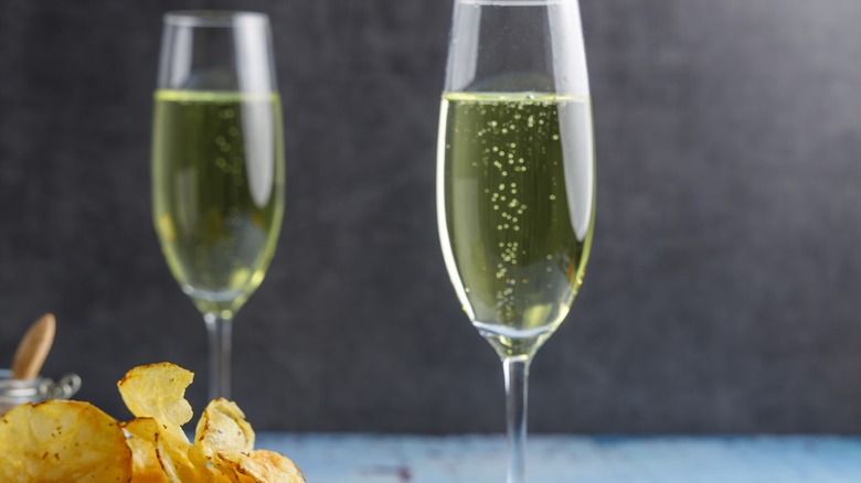 Glasses of champagne and snacks