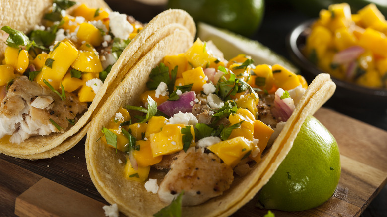Homemade baja tacos with mango salsa