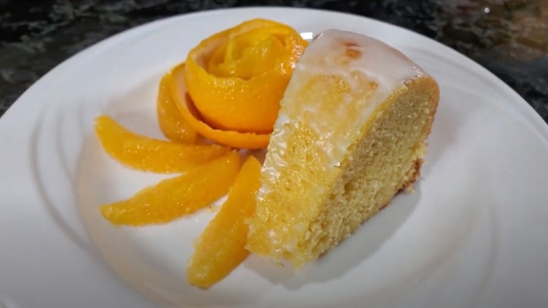 Slice of Harvey Wallbanger cake, with sliced orange arrangement