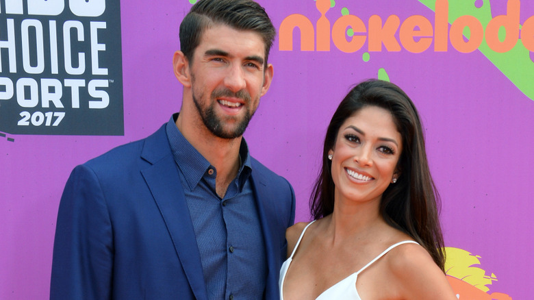 Michael Phelps and Nicole Johnson pose together