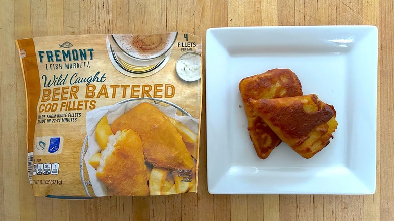 Package and white plate of Fremont Fish Market Wild Caught Beer Battered Cod Fillets