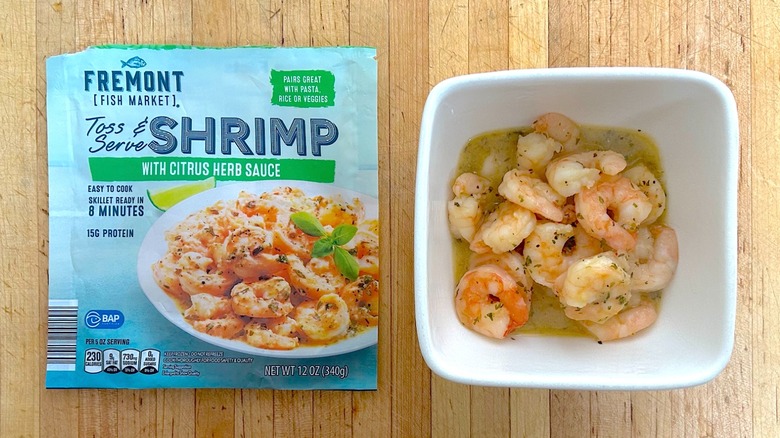 Package and white bowl of Fremont Fish Market Citrus Herb Toss & Serve Shrimp
