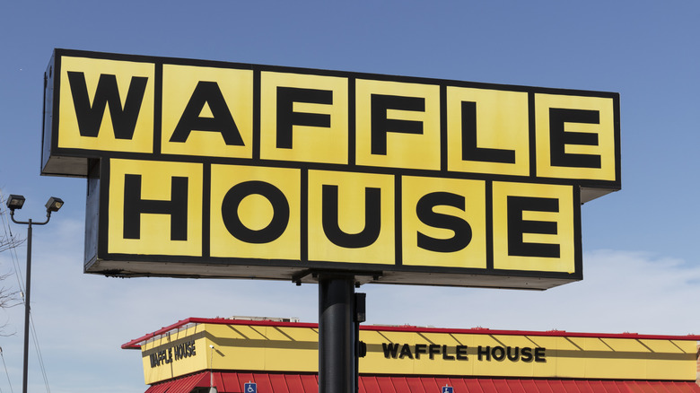 Waffle House sign above restaurant