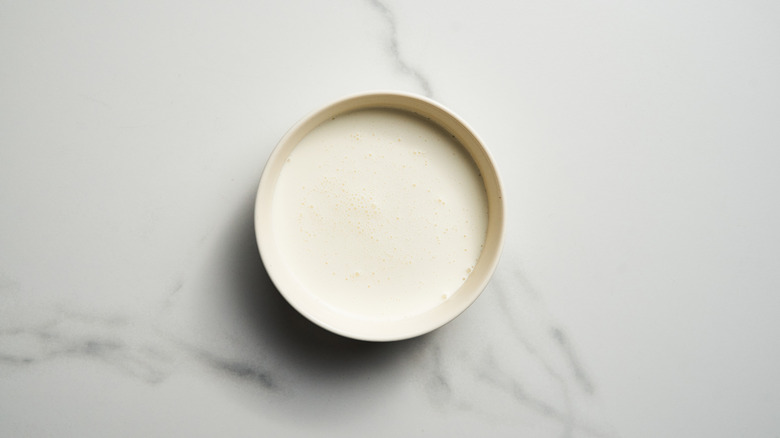 Heavy cream in white bowl