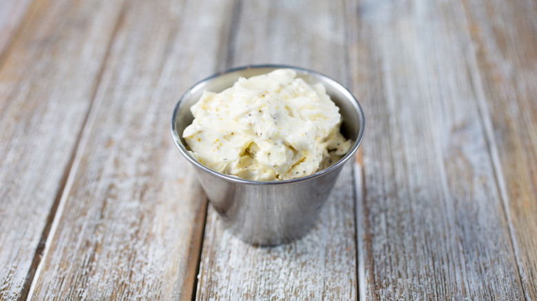 Compound butter in a small metal tub