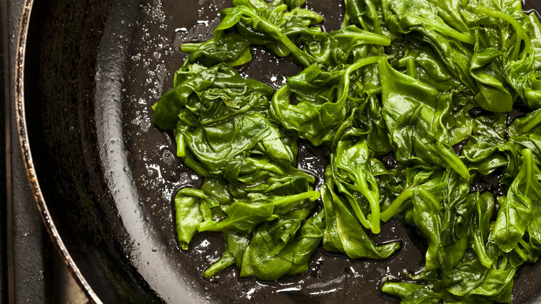 Sautéed spinach in a frying pan