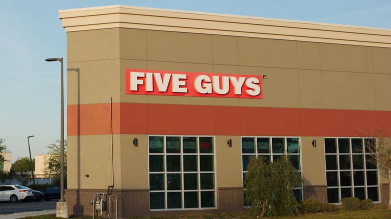 Exterior of a Five Guys fast food location