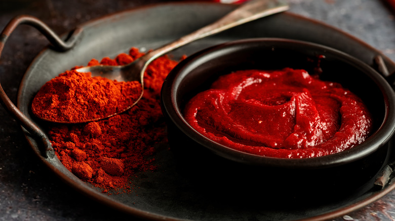 Gochujang and gochugaru are displayed side by side.