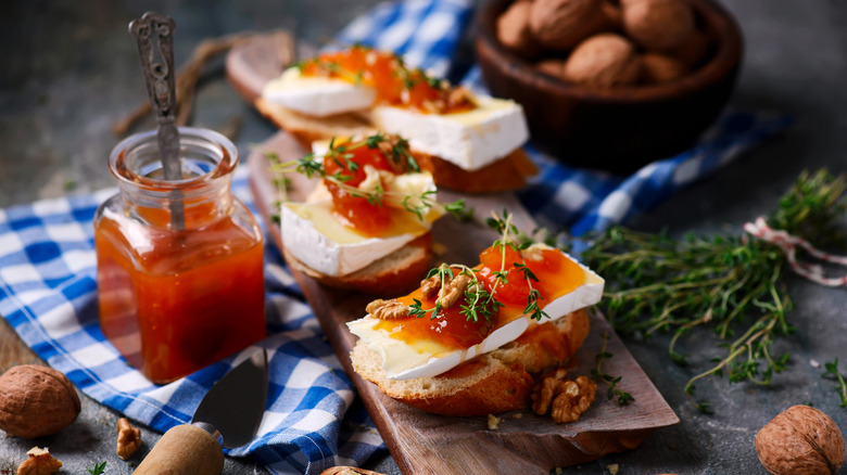 Brie on toast with jam and herbs
