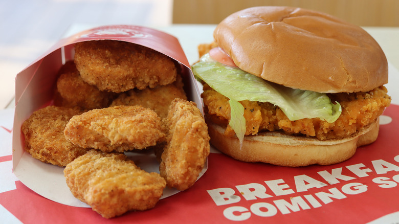Wendy's chicken nuggets and burger on table