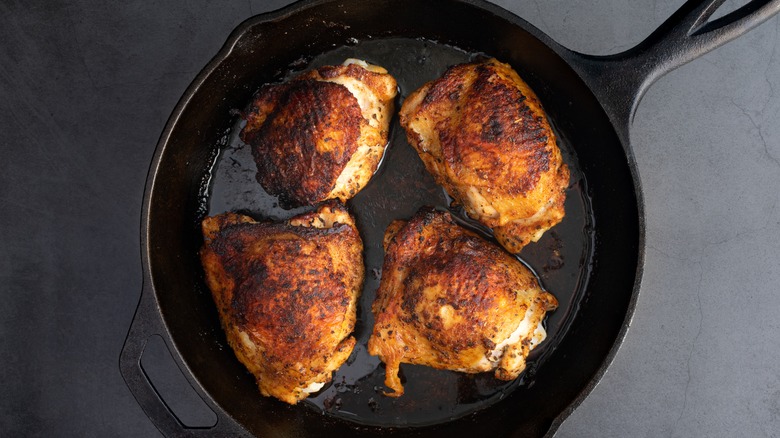 Chicken thighs in skillet
